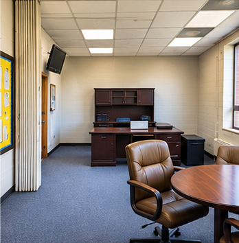 Office and meeting room with carpet, a desk, table, chairs, windows and existing furnishings