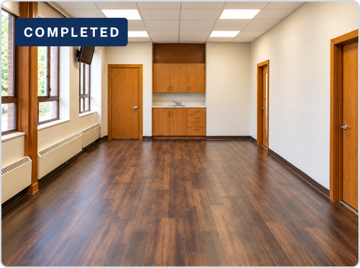 AI-edited finished-room presentation of an office and meeting room with a closed closet door, wood-look flooring, light block walls, wood cabinetry, a sink, windows and ceiling lighting.