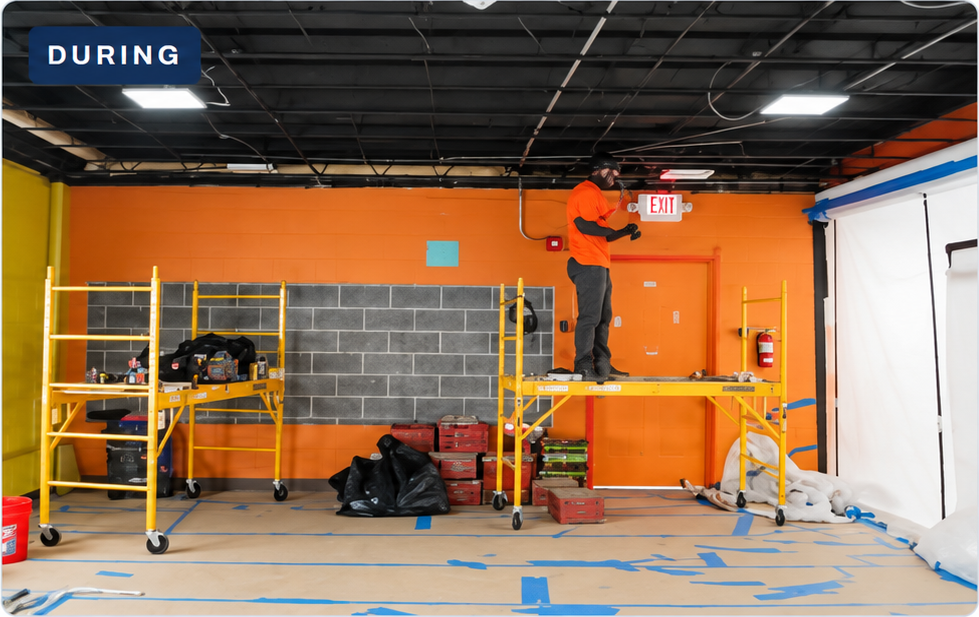 LED light installation from rolling scaffolding in a protected daycare room