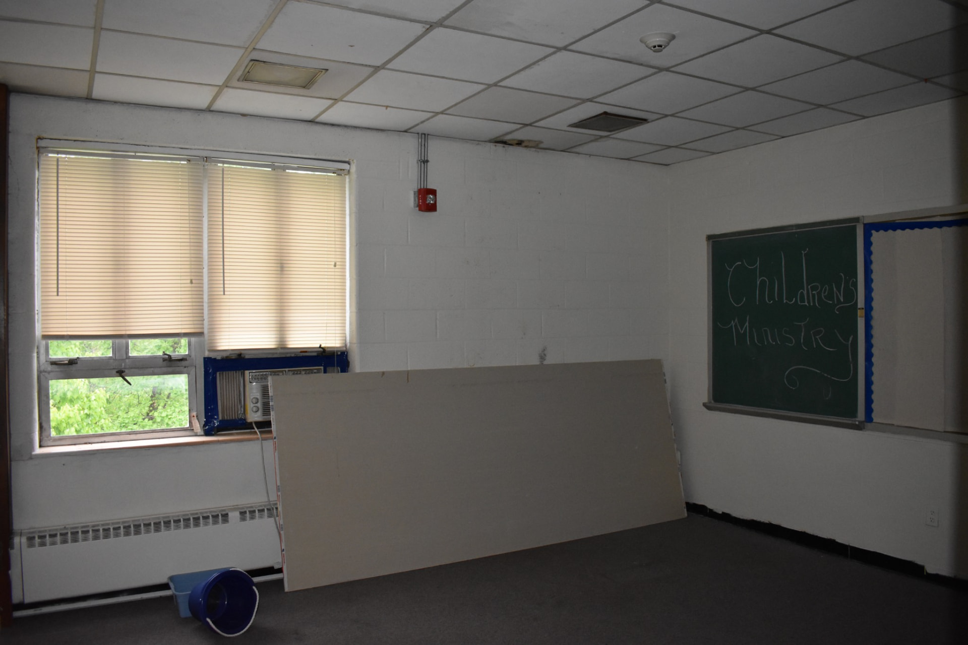 Children's ministry classroom documented before restoration work