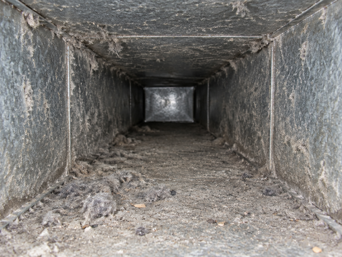 Reference photo of a dust-loaded duct interior
